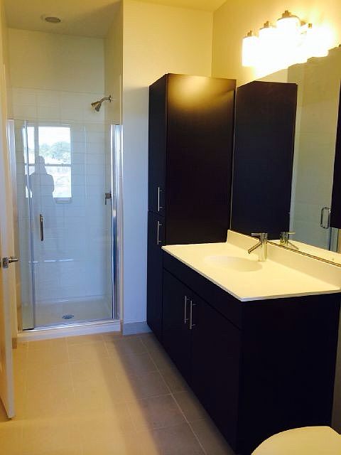 1 of two full baths, other includes a soaking tub.