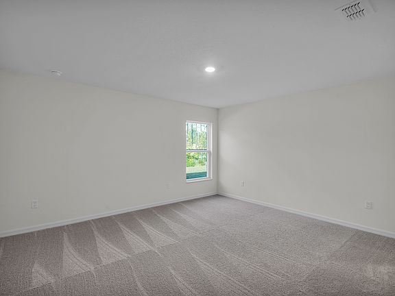 The private master suite is the perfect place to relax after a long day.