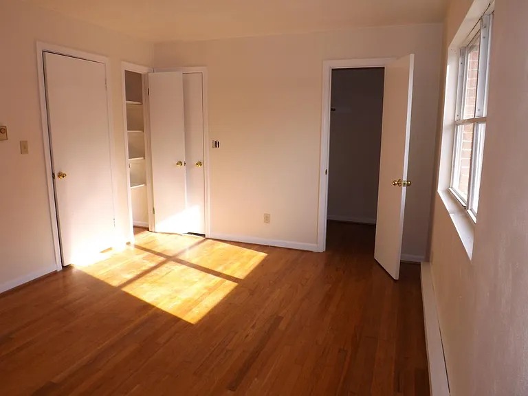 master bedroom with in suite bath, walk in closet, linen closet