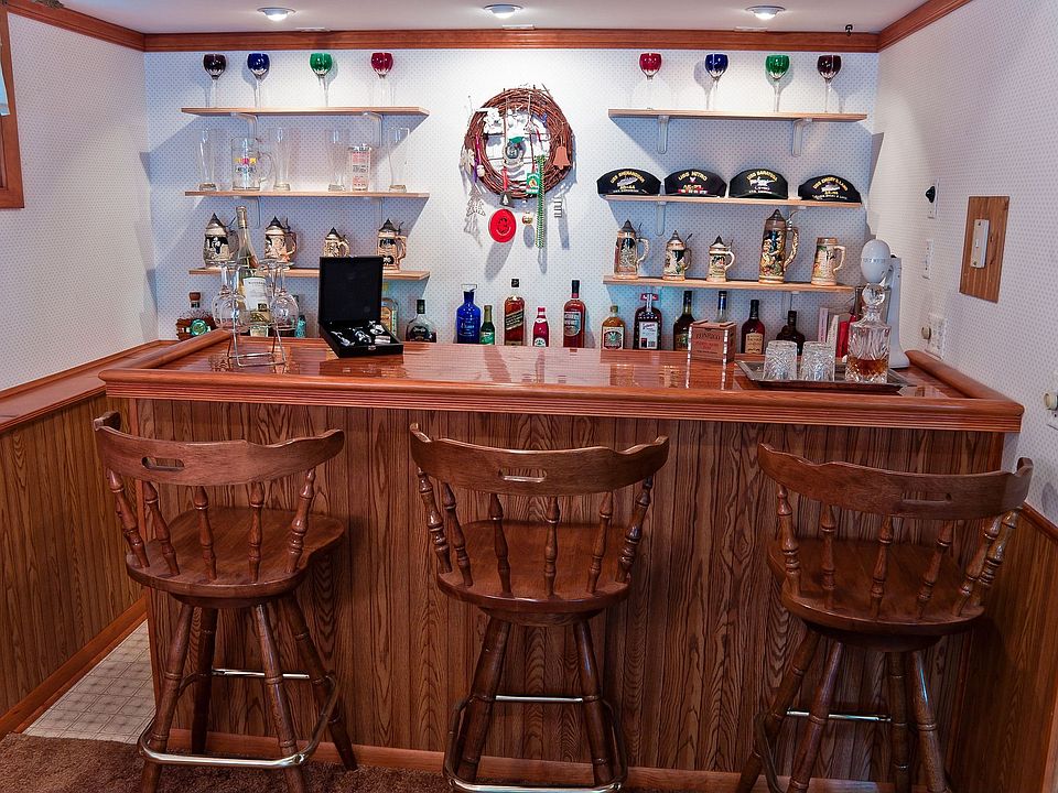 Wet bar, mini fridge, speaker control, integrated bar lighting