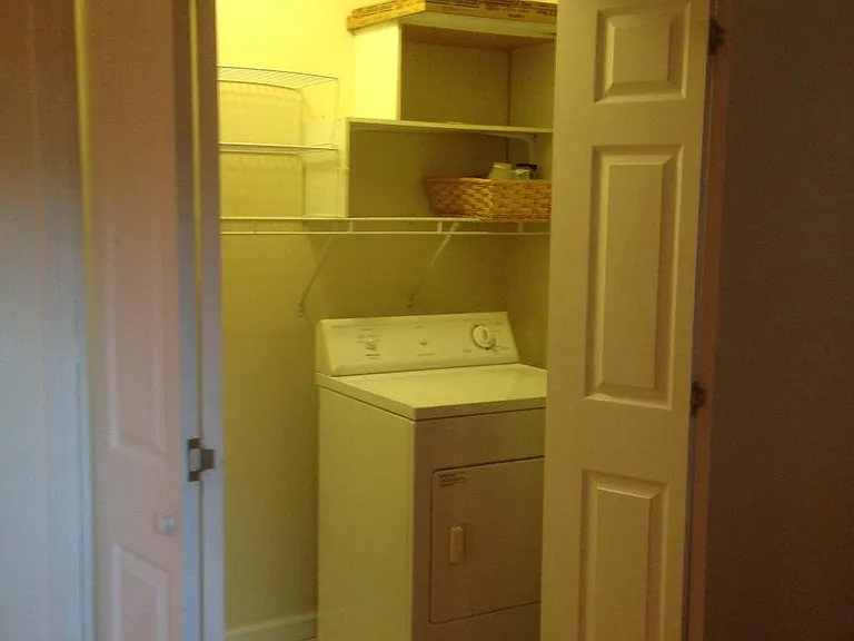 Gas Dryer Provided~In Kitchen~Behind Plantation Doors