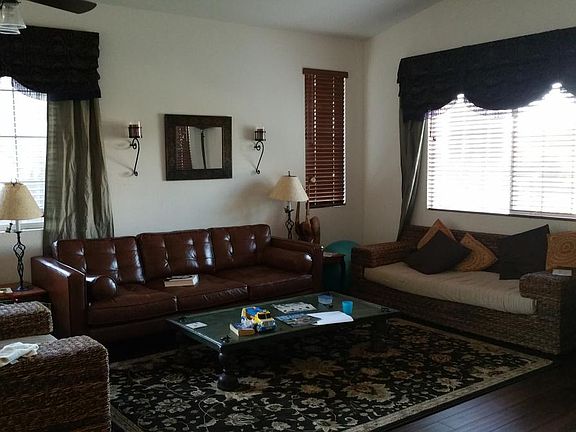 living room - large windows , high ceiling and large windows