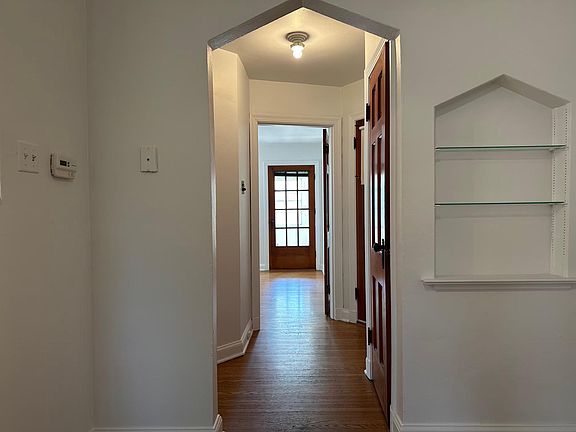 Hallway leading to the bathroom and bedroom