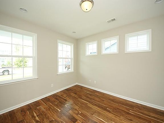 Photos are of a similar home