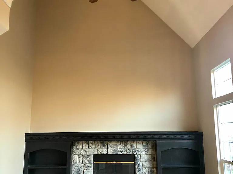 Family Room with cathedral ceiling (open hallway on upper level in front of the master bedroom)