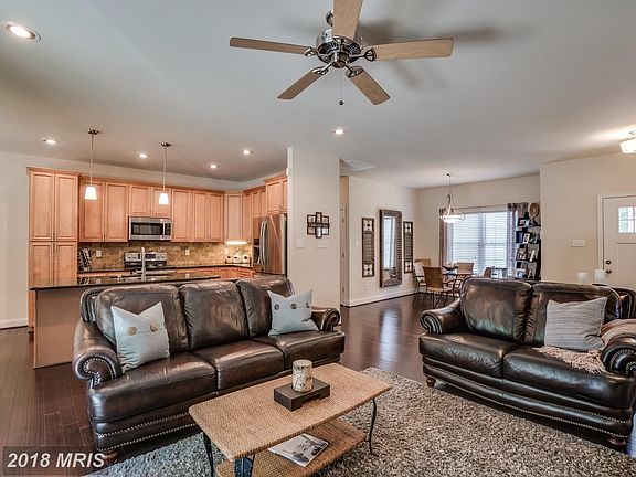 Family Room open to Kitchen and Dining Room