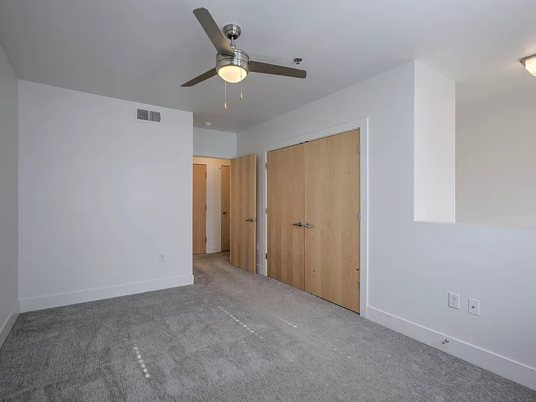 Bedroom view with carpet at The Sawyer.