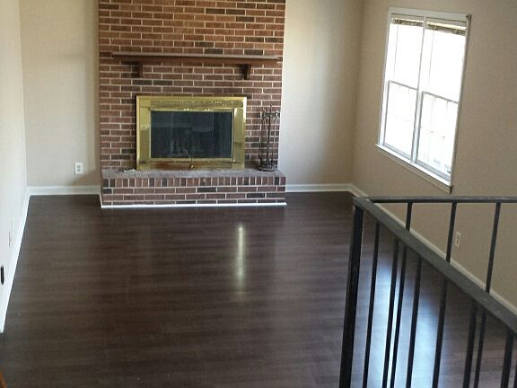 Greatroom view laminate wood flooring.