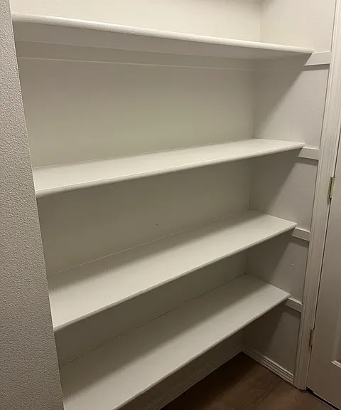 Extra shelves behind the door in the walk-in closet!