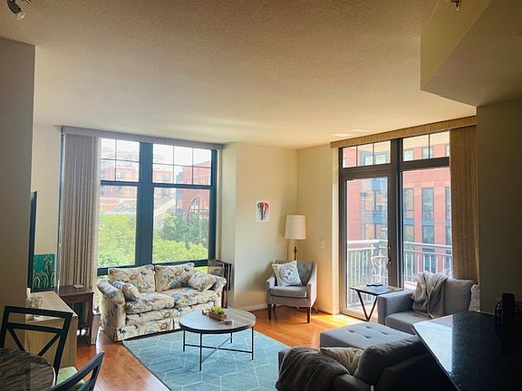 Spacious Living space with Floor to ceiling Windows and access to the balcony
