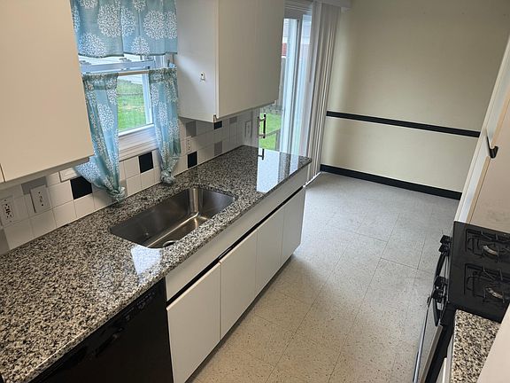 Updated kitchen with granite countertop