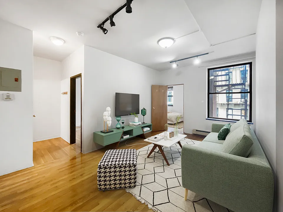 523 W 49th St #3B