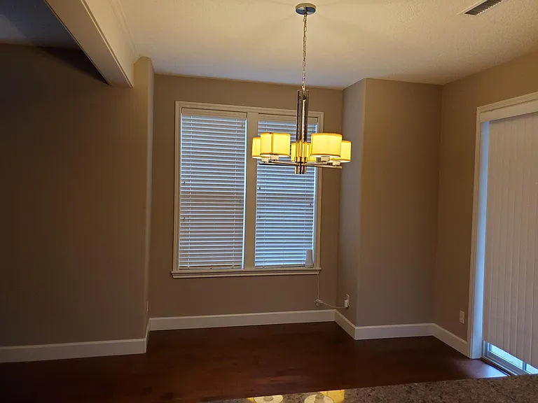 Dining room - Slider to fenced patio.