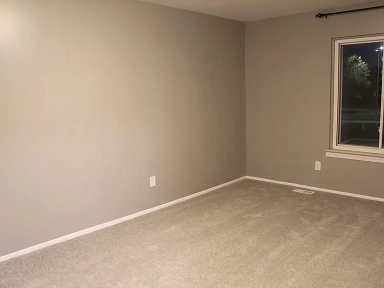 Master bedroom, which has a direct doorway connection to the bathroom