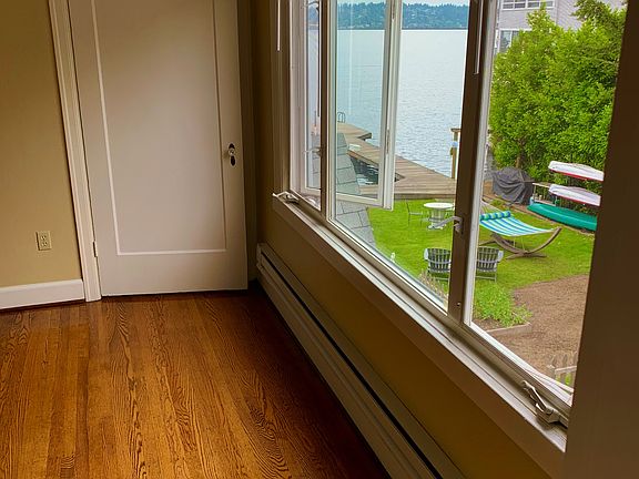 View of Lake Washington and Courtyard facing East. All day light filled with windows facing north and south.