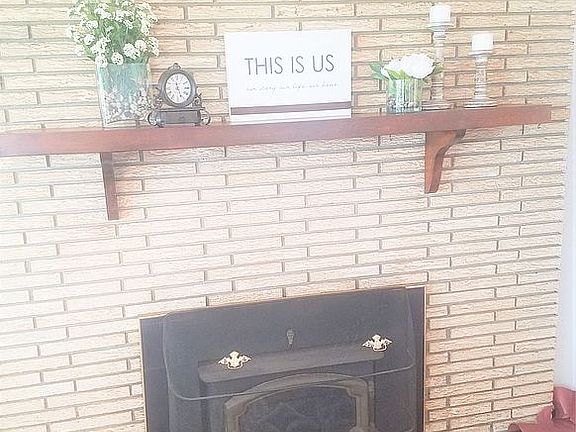 Cozy up by the fireplace
