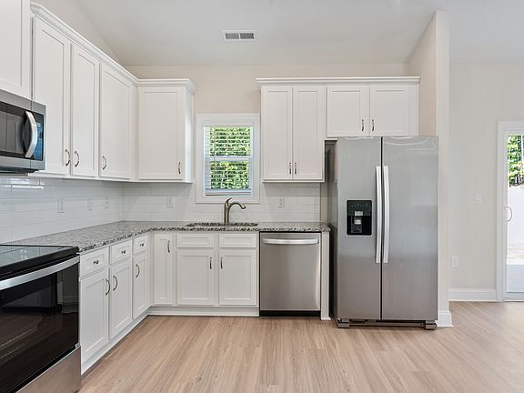 Kitchen includes stainless steel appliances