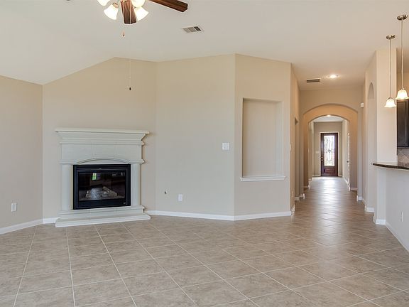 Social Family Room with Crackling Fireplace