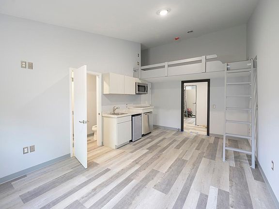 Bunk bed and small closet on loft level