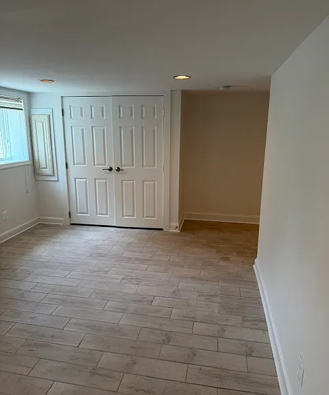 Finished basement provides extra space for a home office, gym, playroom, or craft area