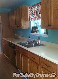 Galley Kitchen : Enjoy cooking in this spacious kitchen. Lots of cabinets! Stove included.