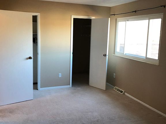 Bedroom 1 with walk in closet and standard closet