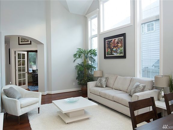 Huge living room with tall ceilings and abundant natural light