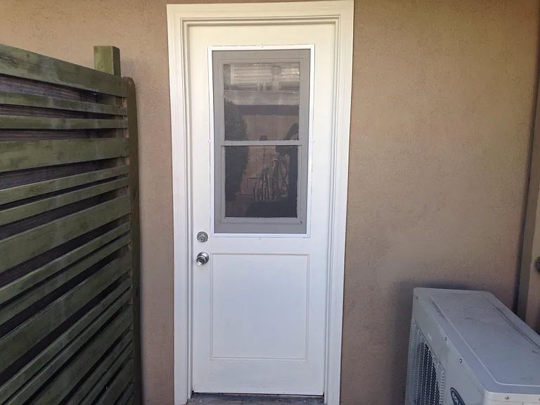 Door to shared laundry
