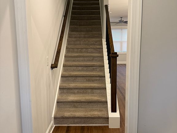 Entryway! Small bench and spot for shoes on the right. Hall closet as soon as you enter on the right