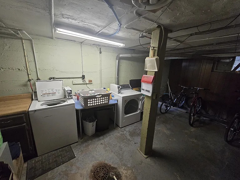Shared laundry room with storage