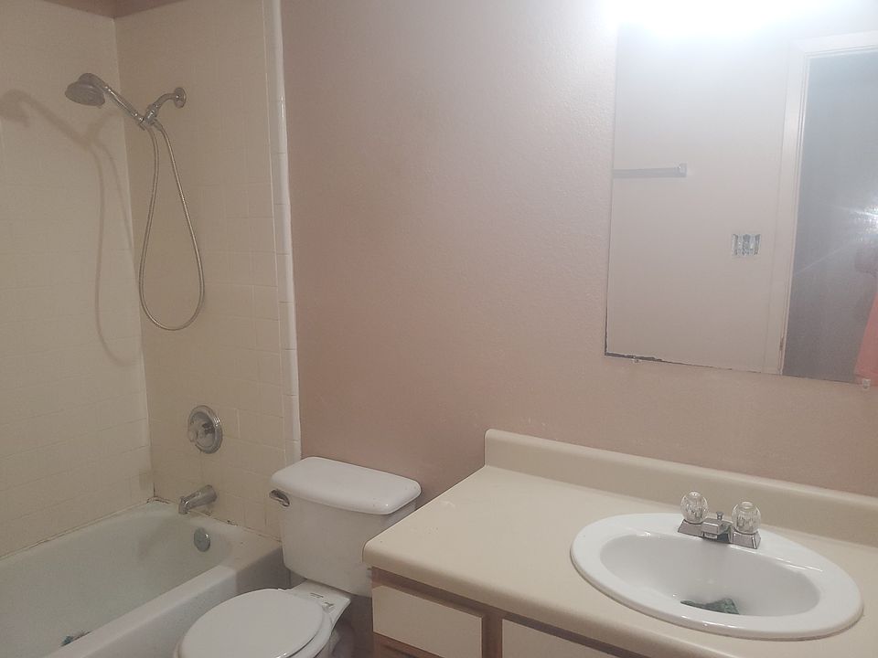 Hallway fulll bathroom.