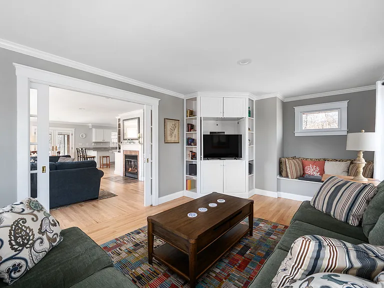 Den/TV room with French pocket doors that can close for added privacy.