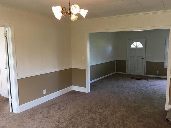 Spacious dining room opens into the living room.