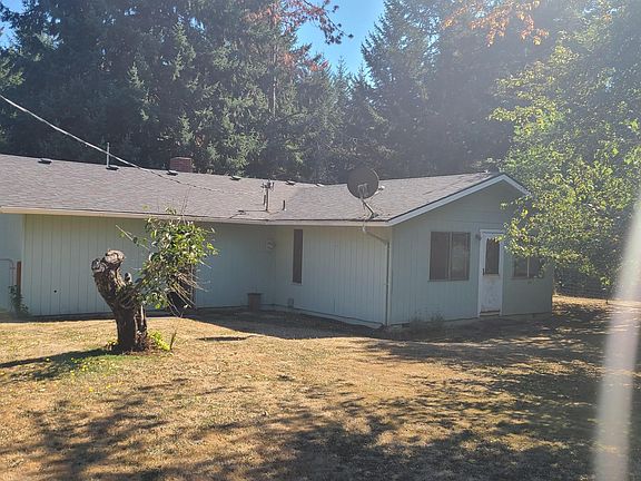 Back yard taken from inside of fenced area.
