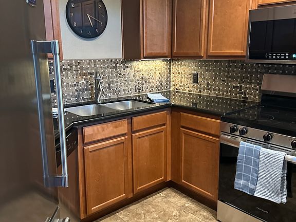 Stainless Steel Kitchen with Granite Countertops