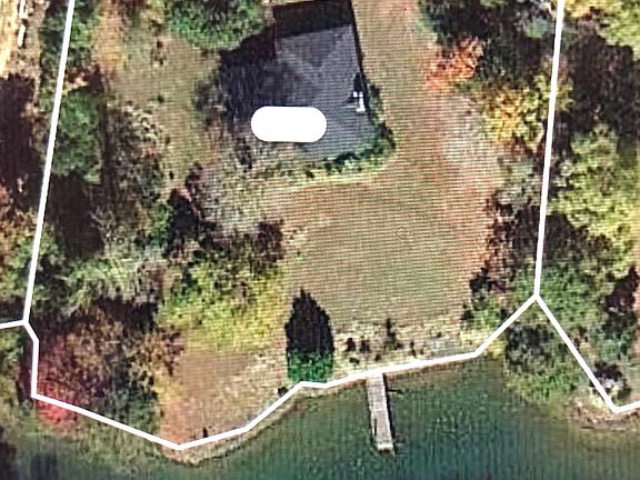 Aerial photo of our house at 5221 Green Cove waterfront 4BR/2BA house and pier in Lake Wylie, SC FSBO for $899,000.