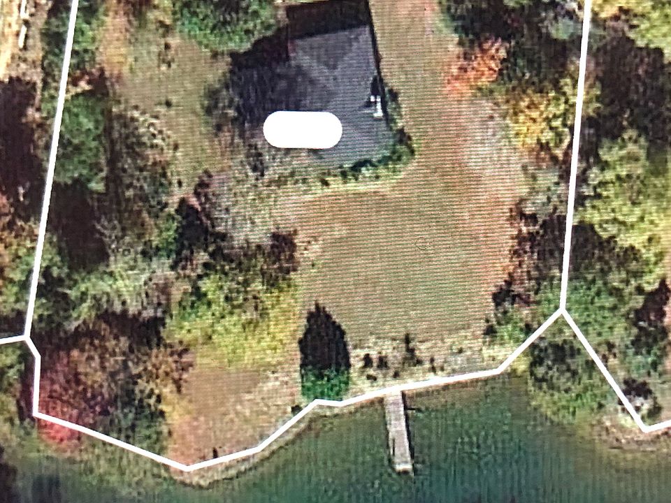 Aerial photo of our house at 5221 Green Cove waterfront 4BR/2BA house and pier in Lake Wylie, SC FSBO for $899,000.