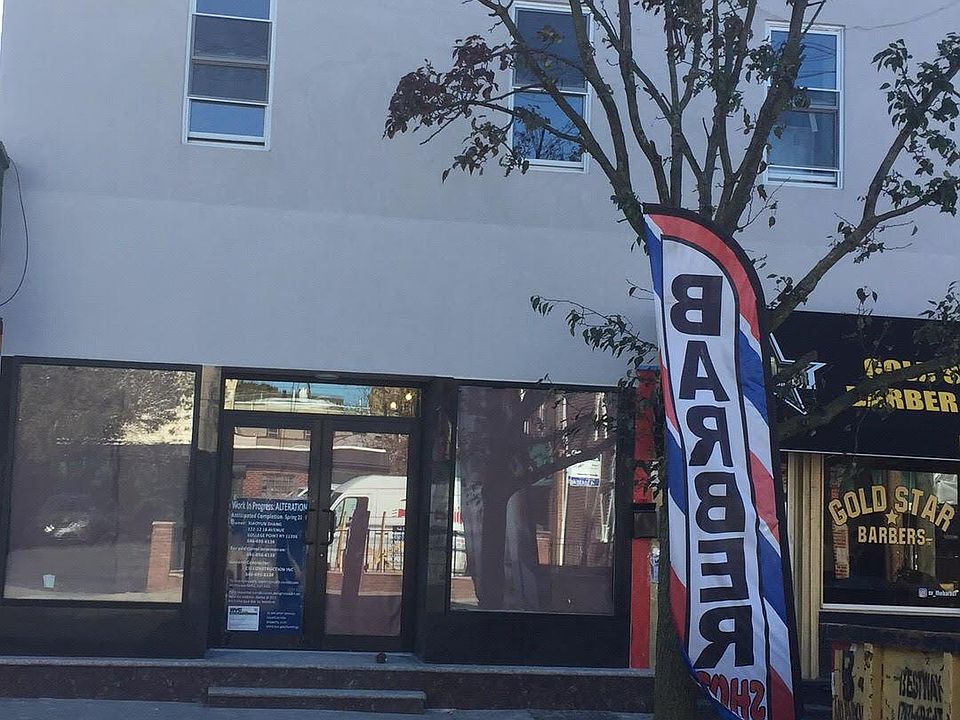 Front of the apartment. The 1st floor is a store front.