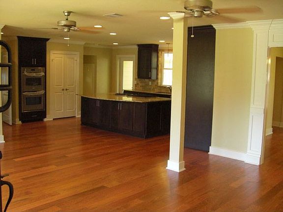 open living and kitchen with gorgeous hard wood floors