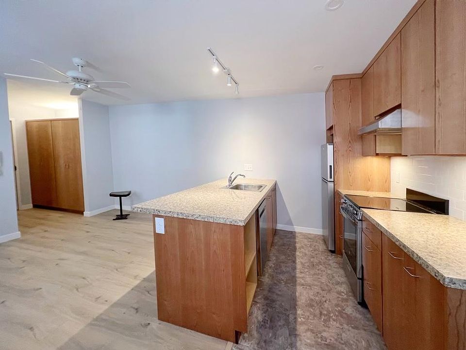 kitchen and view of entry closets