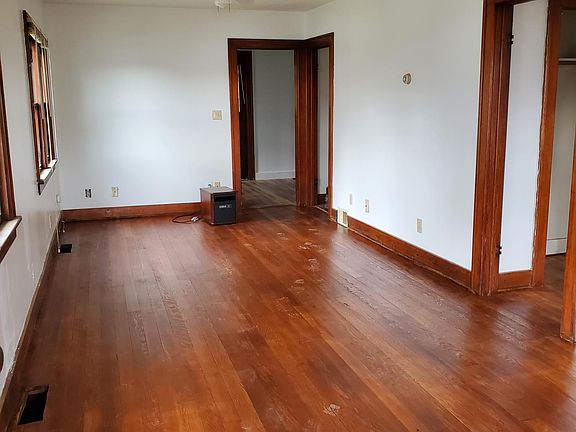 Floors just re-finished. Easy to clean, bright - all fresh paint.