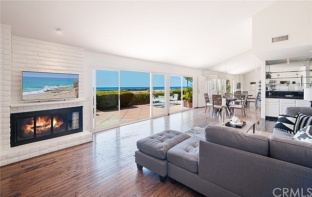 Spacious Living Room with Vaulted Ceilings
