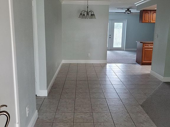 as you walk in (kitchen is different colors now)