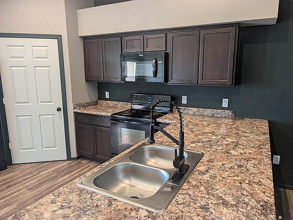 4th image of 7293 E 39th Pl
