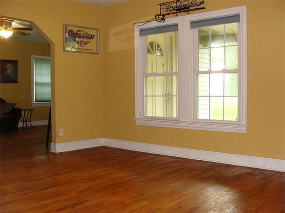 Dining Room with Arch Open into Living