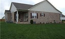 Huge lawn. Covered Porch with fan