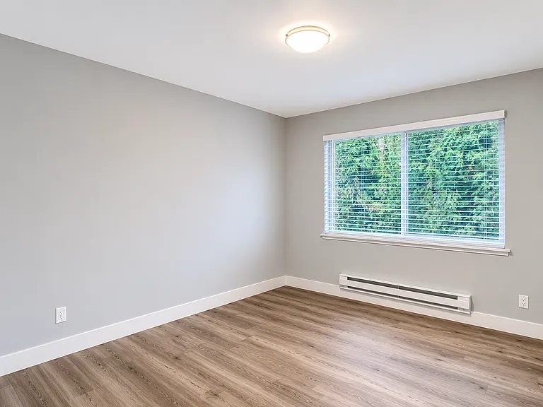 Soak in the privacy as the Primary bedroom backs onto the greenbelt. It's quiet, it's green, and it is mesmerizing. 

Engineered vinyl plank flooring runs through the condo.