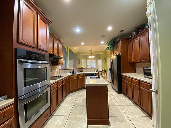 3rd image of 10042 Cypress Lake Dr N