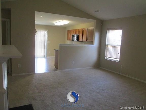 Great room opens to kitchen.