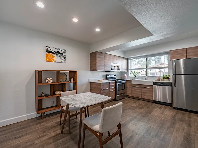 Our 2nd floor homes feature wood look cabinetry, stainless steel appliances, and plenty of space for dining!